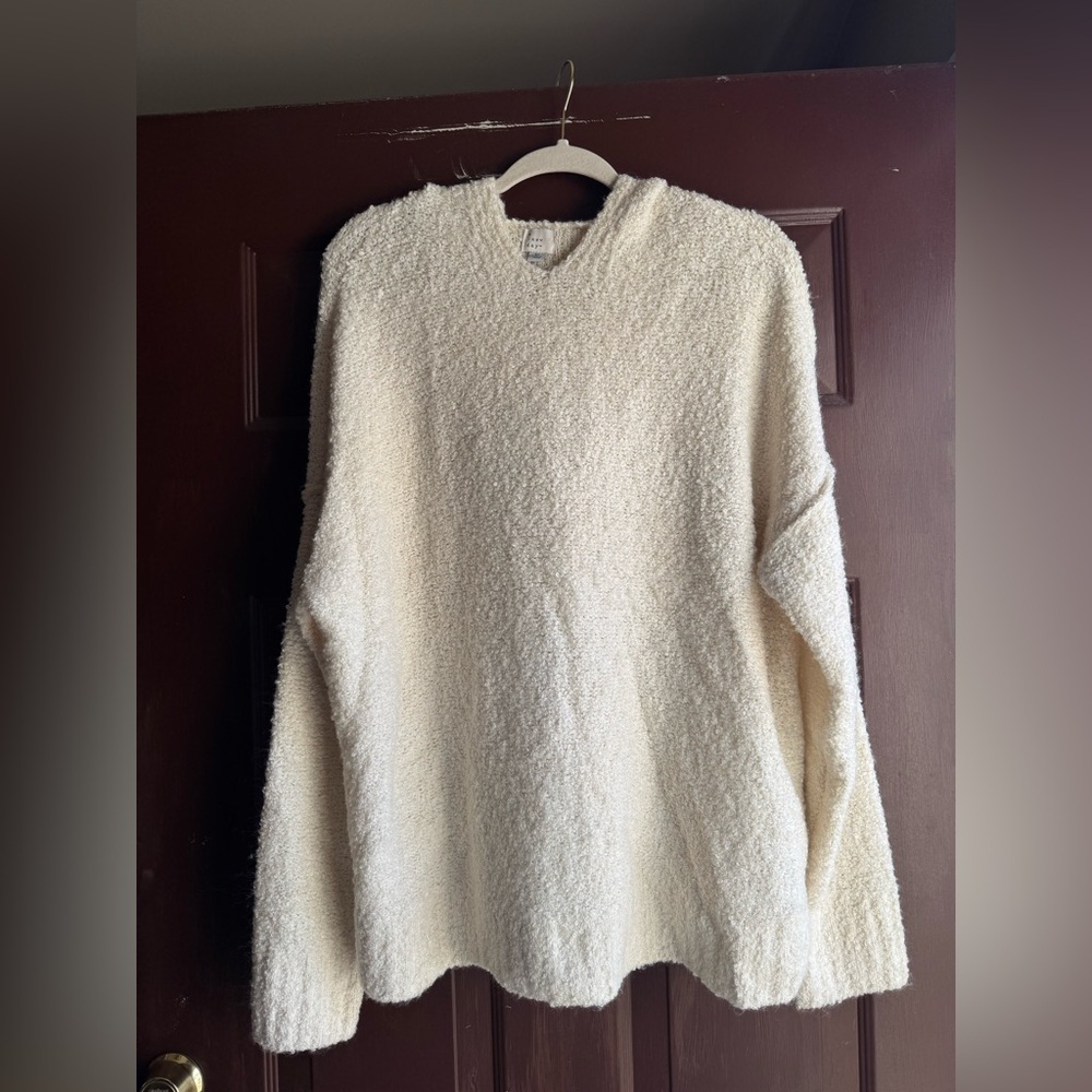 A New Day Hoodie Sweater Size XL there are a few pulls on it